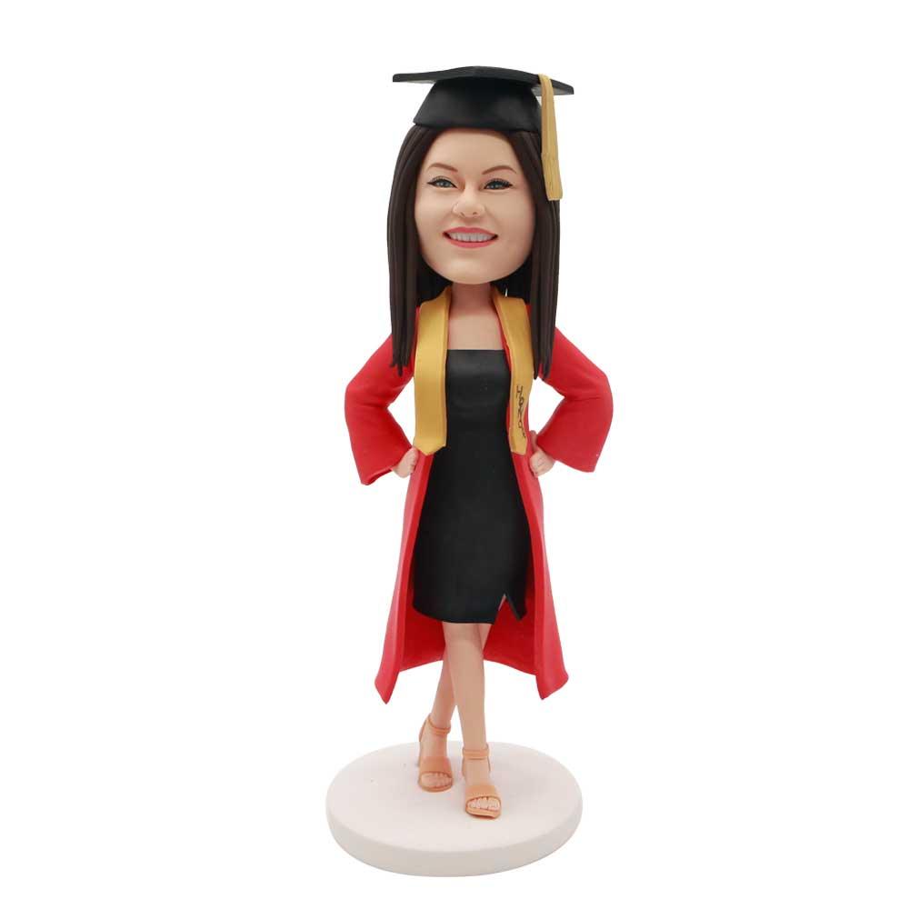 Female Graduates In Black Dress And Red Gown With Arms Akimbo Custom Graduation Bobblehead Female Graduates In Black Dress And Red Gown With Arms Akimbo Custom Graduation Bobblehead