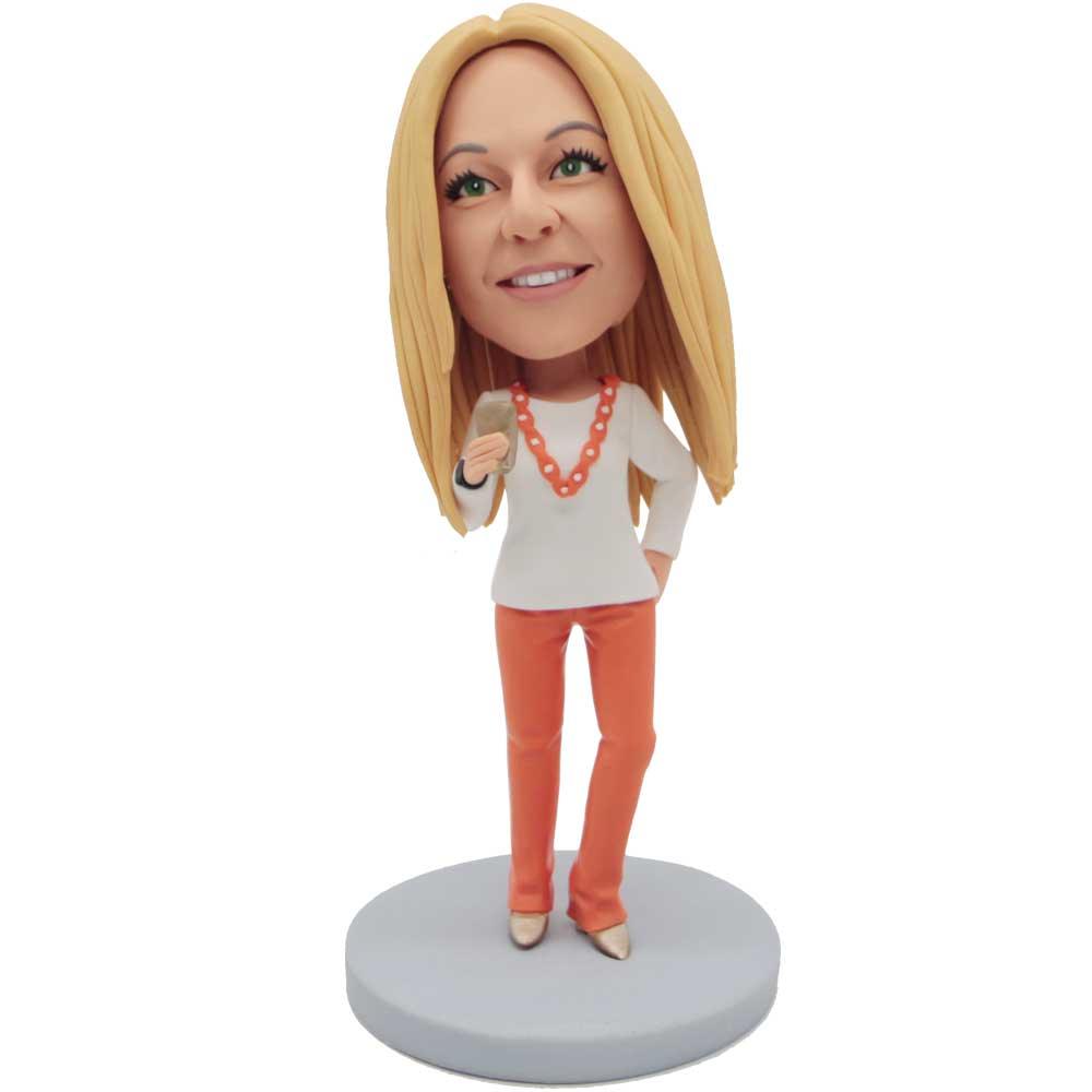 Female In Orange Pants Holding A Mobile Phone Custom Figure Bobbleheads